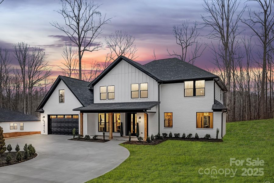 Front exterior of a new home in , Waxhaw, NC, highlighting curb appeal (Image 30). Front exterior of a new home in , Waxhaw, NC, highlighting curb appeal (Image 30).