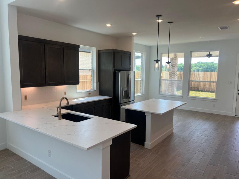 Furnished interior view inside a new home in Wood Leaf Reserve, Tomball (Image 4).