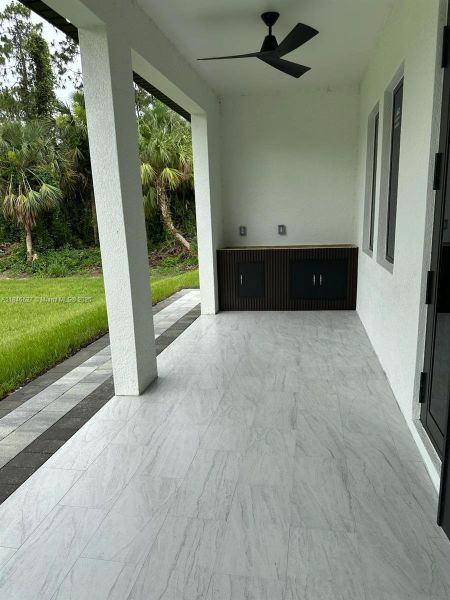 Exterior details and patio area of a home in , Lehigh Acres (Image 4).