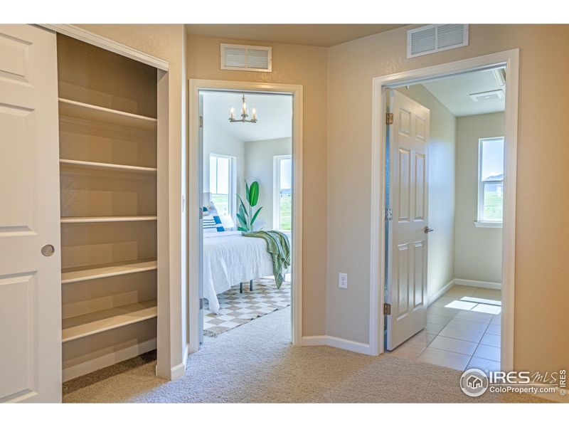 second story linen closet, next to Laundry and bedrooms.