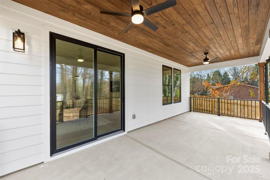 Exterior details and patio area of a home in , Belmont (Image 3).