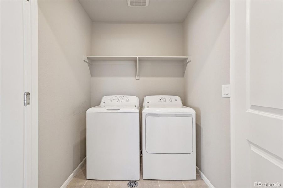 Furnished interior view inside a new home in Woodrose at Painted Prairie, Aurora (Image 25).