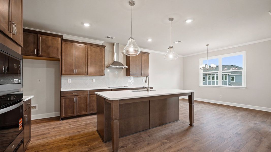 Representative furnished interior of a home built from the Emerson by D.R. Horton in Evergreen Crossing, Locust Grove (Image 7).