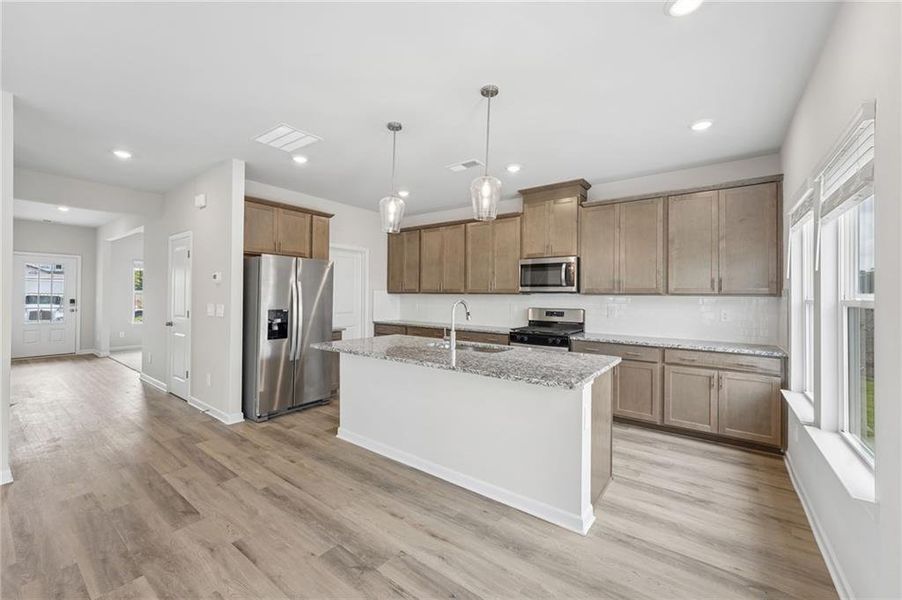 Furnished interior view inside a new home in Northwoods at Mirror Lake, Villa Rica (Image 6).