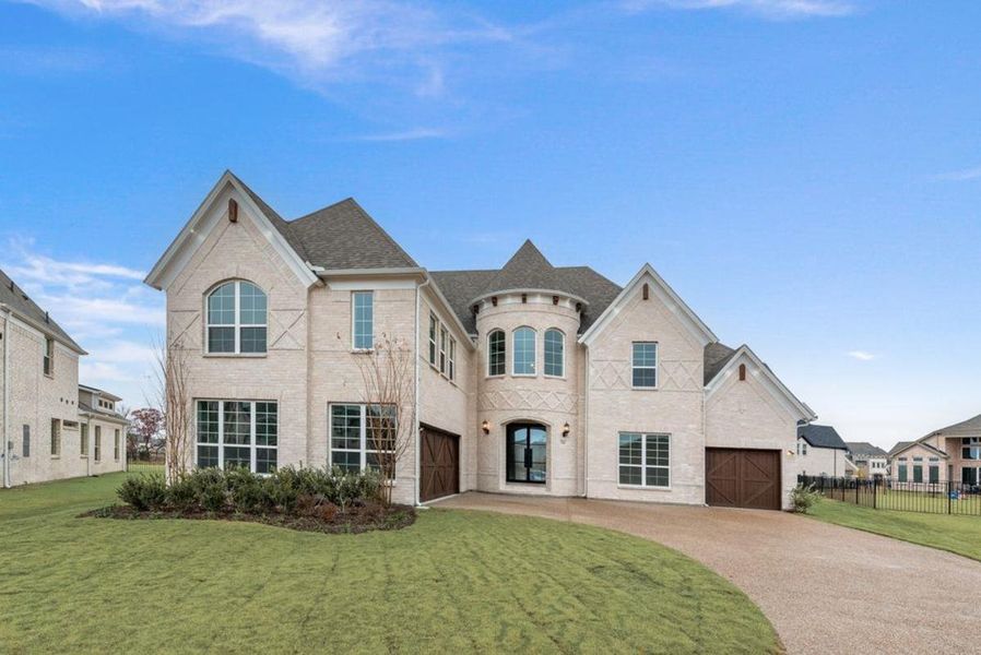 Representative exterior photo of a completed home built from the Grand Legacy by Grand Homes in Heath Golf & Yacht Club, Heath, TX (Image 19).