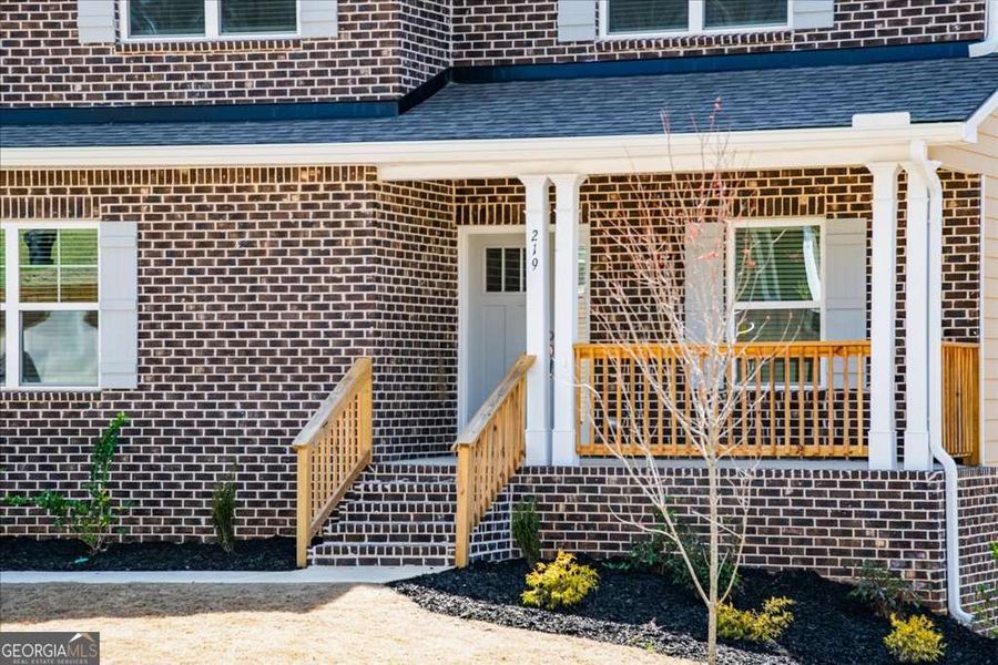 Front exterior of a new home in Carson's Walk, Macon, GA, highlighting curb appeal (Image 20).