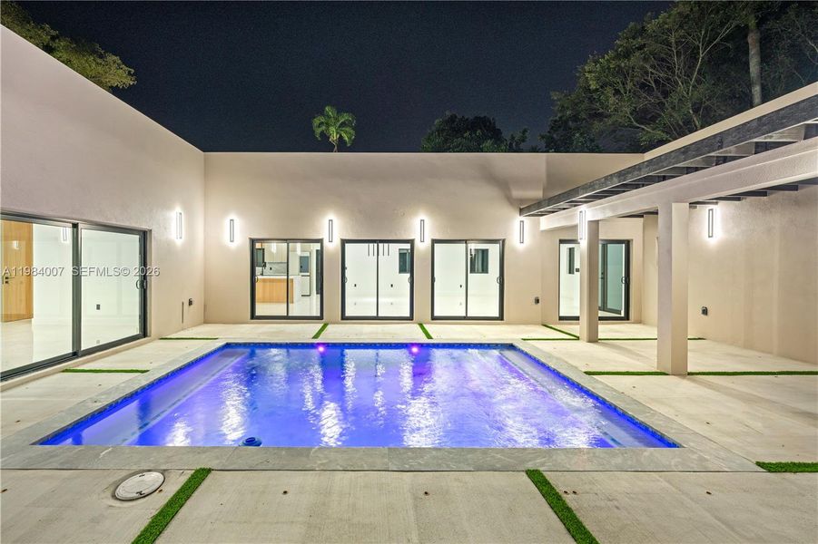 Exterior details and patio area of a home in , North Miami (Image 42).