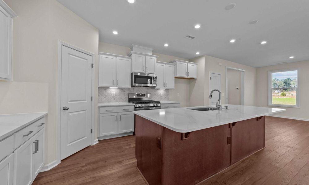 Representative furnished interior of a home built from the The Sycamore by Chesapeake Homes in Terrapin, Leland (Image 7).