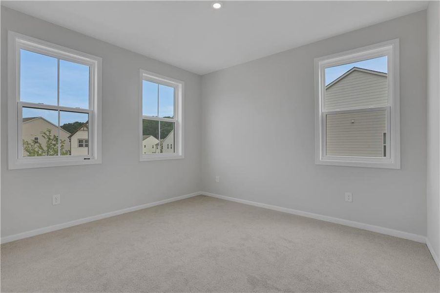Spacious, unfurnished interior of a new home in The Paddocks at Doc Hughes, Buford (Image 34).
