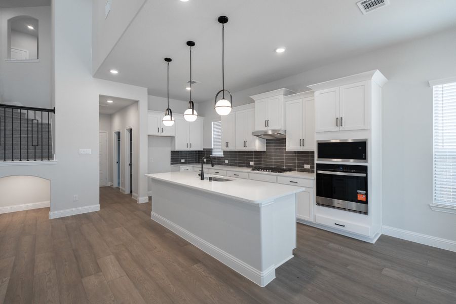 Furnished interior view inside a new home in Valencia on the Lake, Little Elm (Image 6).