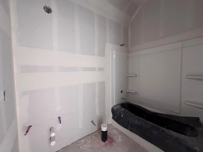 In-progress construction of a new home in The Colony 50s, Bastrop, TX (Image 5).