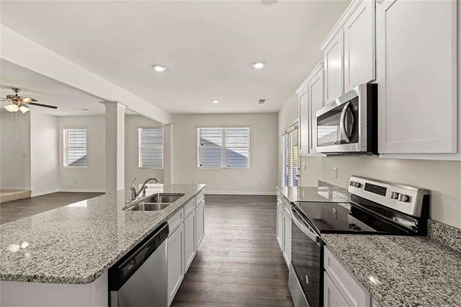 Furnished interior view inside a new home in Oakchase at Hampton, Hampton (Image 4).