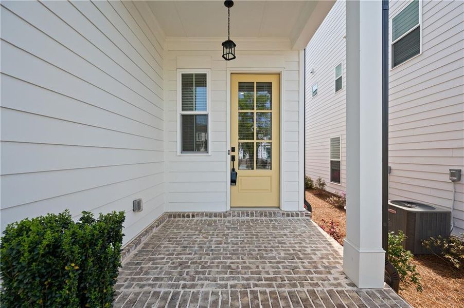 Exterior details and patio area of a home in Palisades Single Family, Cumming (Image 4).