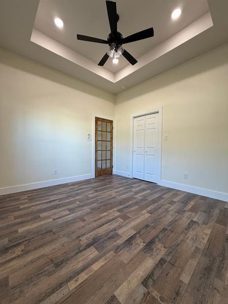 Office bedroom with stained wood glass office door with custom designer lightning.