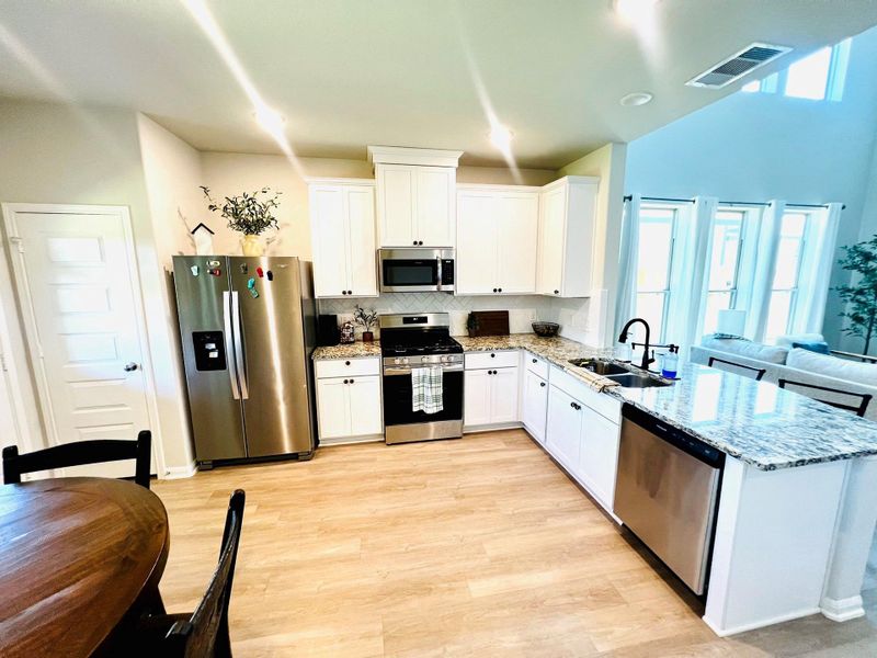 Furnished interior view inside a new home in Bluebonnet Village, Bellville (Image 4).