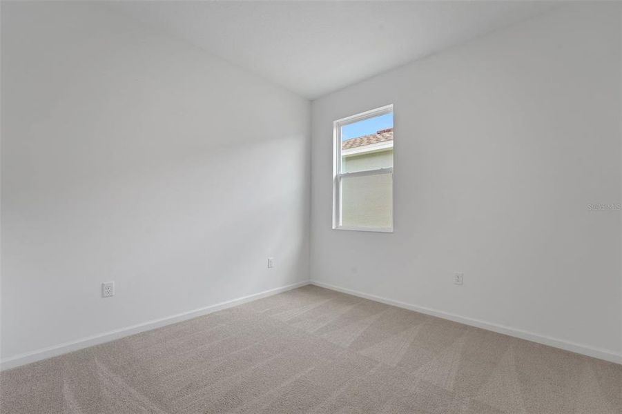 Spacious, unfurnished interior of a new home in Annabelle Estates, Winter Haven (Image 27).