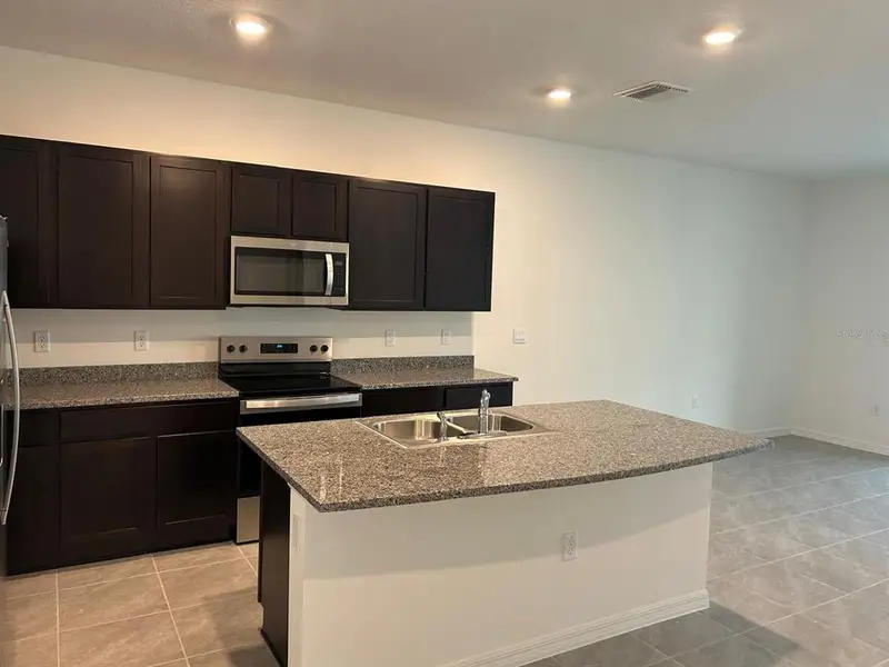 Furnished interior view inside a new home in , Wimauma (Image 5).