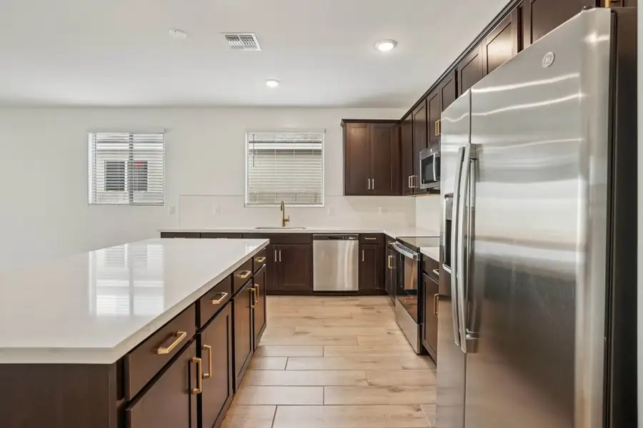 Kitchen featuring the Oxford Collection. Finishes and colors may vary by community.