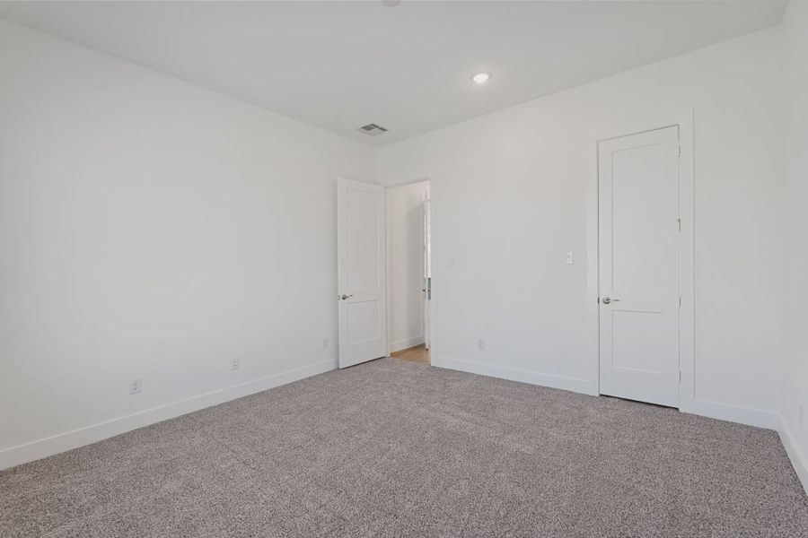 Representative unfurnished interior of a home built from the Brentwood by Chesmar Homes in Meridiana 50's and 60's, Manvel (Image 25).