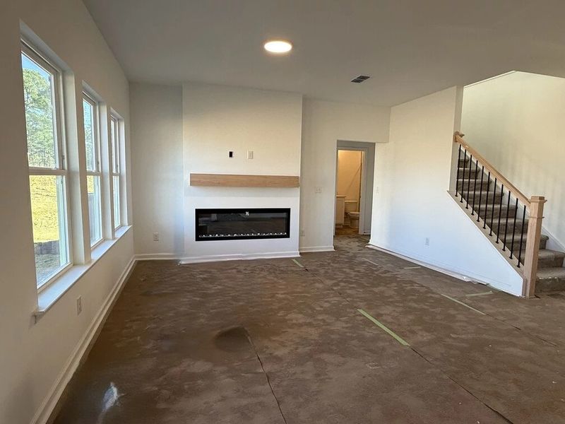 Family Room featuring the AW Collection® Coastal - Open and airy with soft-toned finishes.