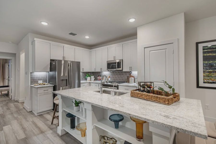 Furnished interior view inside a new home in Centero at Stone Oak, San Antonio (Image 3).