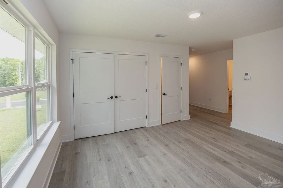 Spacious, unfurnished interior of a new home in Parkland Place, Pace (Image 17).