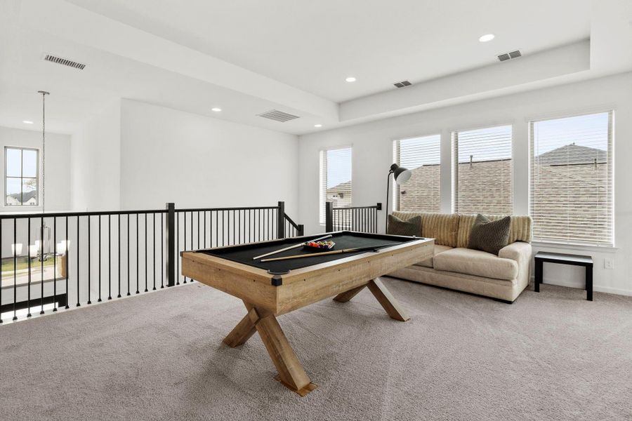 Expansive upstairs game room overlooking the family room, perfect for a pool table or media space. Expansive upstairs game room overlooking the family room, perfect for a pool table or media space.