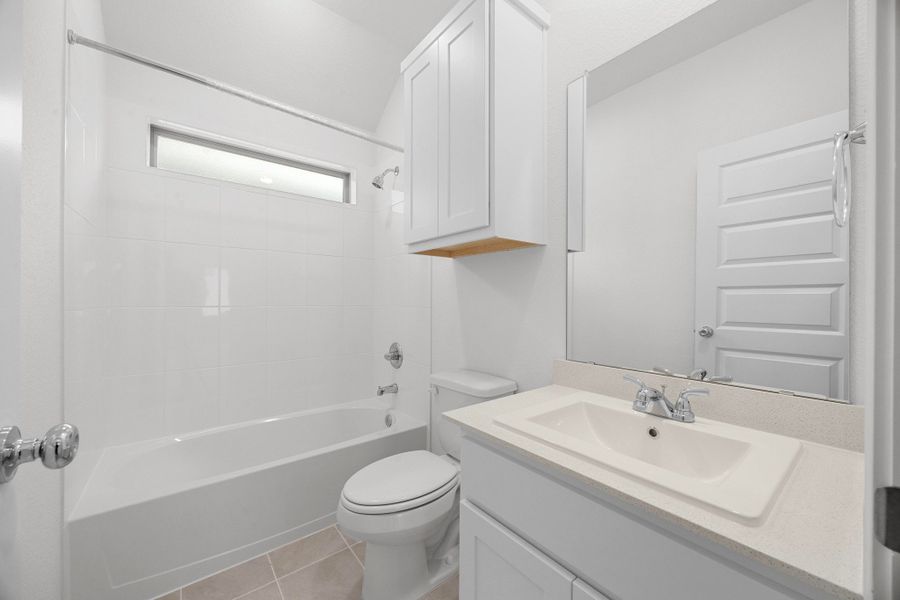 Bathroom in the Cypress home plan by Trophy Signature Homes - REPRESENTATIVE PHOTO