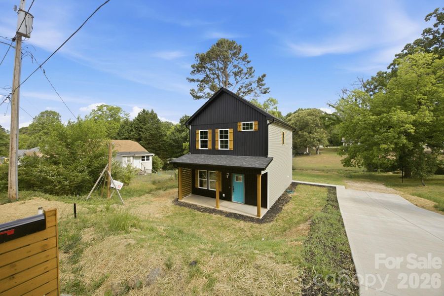 Front exterior of a new home in , Kannapolis, NC, highlighting curb appeal (Image 25).