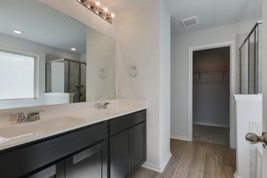Representative furnished interior of a home built from the Dunlap by Ashton Woods in Meadows at Hennersby Hollow 40's, San Antonio (Image 10).