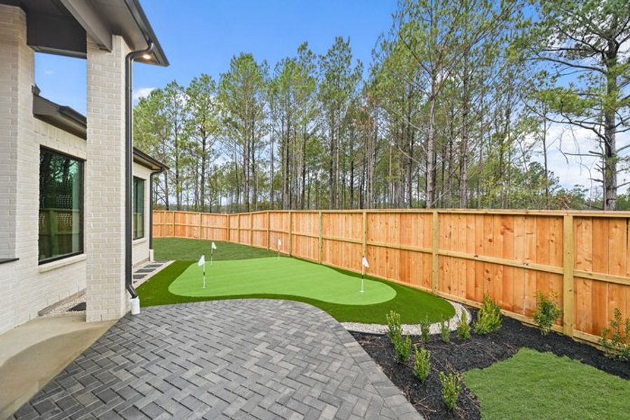 Exterior details and patio area of a home in Wildtree 70', Montgomery (Image 4).