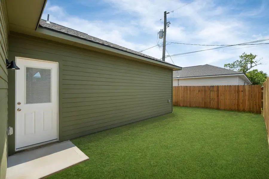 Exterior details and patio area of a home in , Baytown (Image 3).