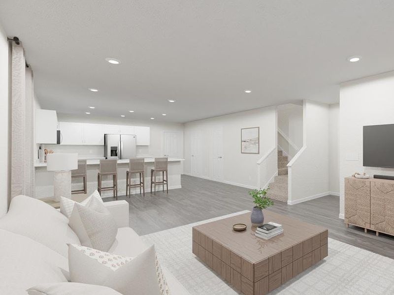 Enjoy a welcoming, open living area - Artist`s rendering of the Lilly by Highland Homes