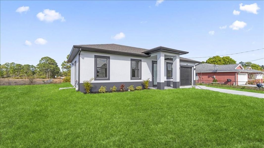 Exterior details and patio area of a home in , Lehigh Acres (Image 3).
