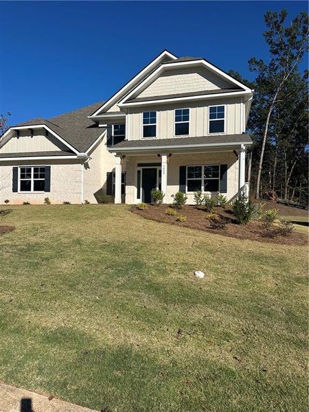 Exterior details and patio area of a home in Mirror Lake at South Harbour, Villa Rica (Image 3).