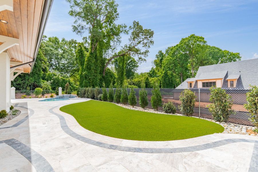 Exterior details and patio area of a home in , Belmont (Image 32).