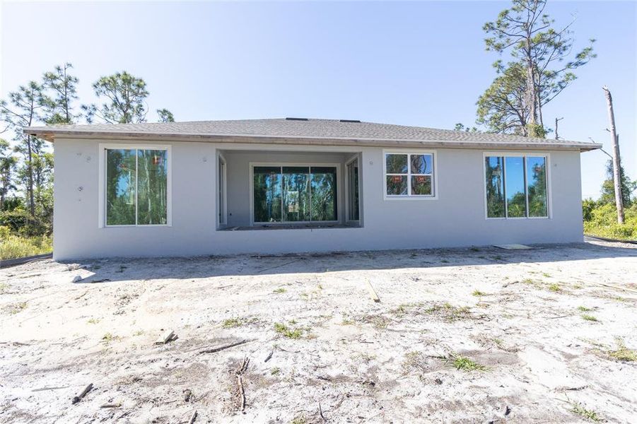 Front exterior of a new home in , Port Charlotte, FL, highlighting curb appeal (Image 18).