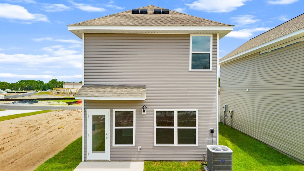 Exterior details and patio area of a home in Salt Pines, Port Saint Joe (Image 18).