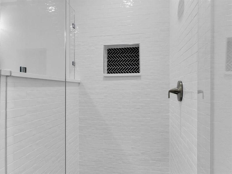 Details with a shower with door