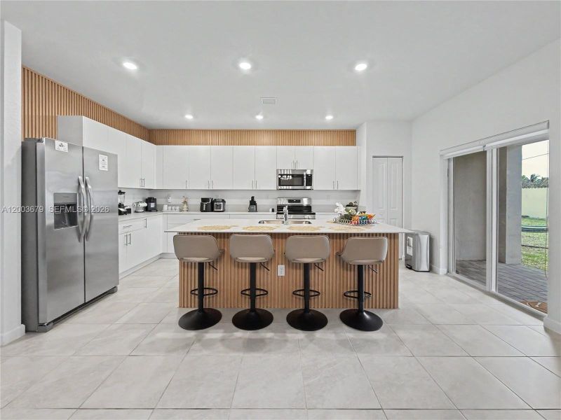 Furnished interior view inside a new home in , Miami (Image 8).