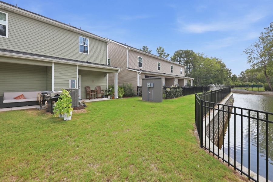 Exterior details and patio area of a home in , Wando (Image 24).