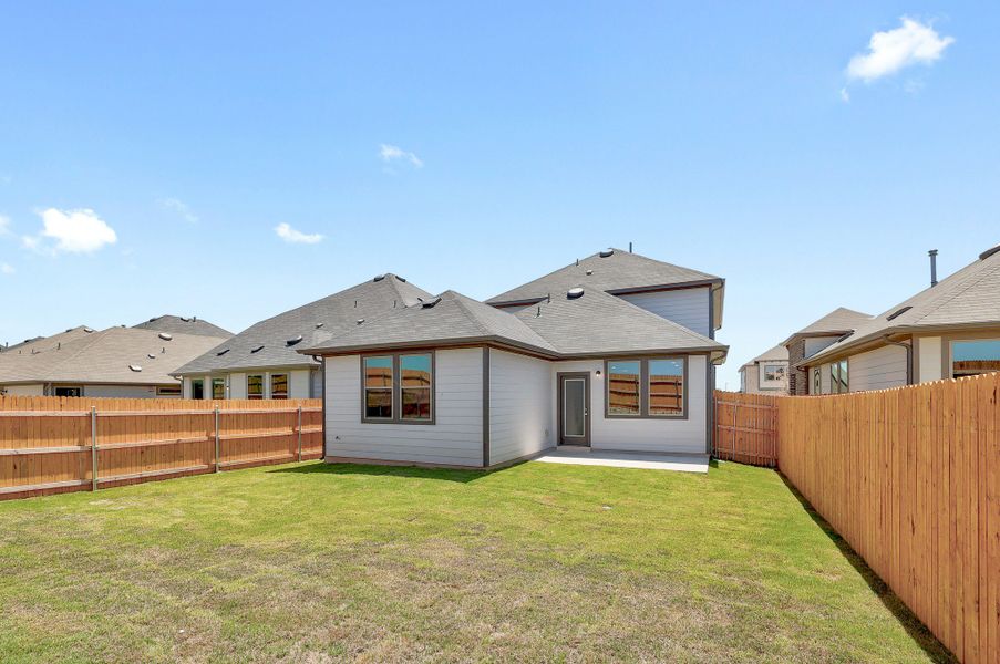 Exterior details and patio area of a home in Trinity Ranch, Elgin (Image 4).