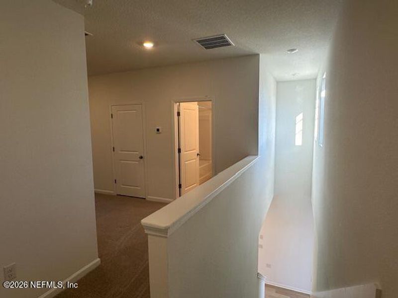 Spacious, unfurnished interior of a new home in Brook Forest - Townhomes, St. Augustine (Image 21).