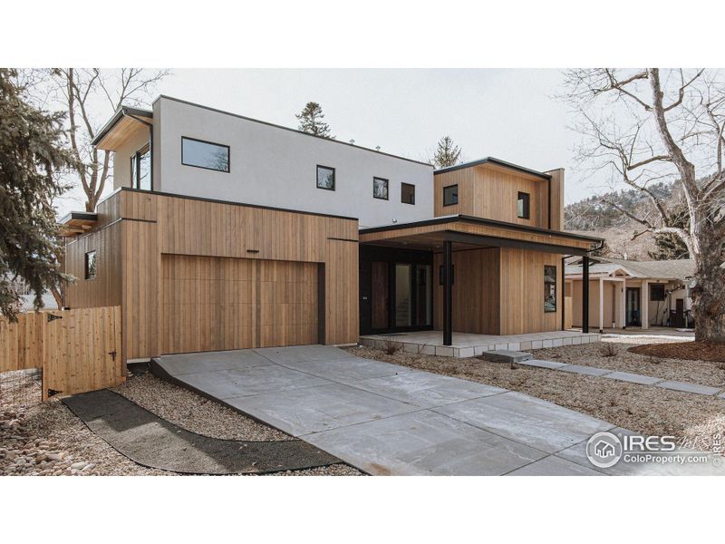 Front exterior of a new home in , Boulder, CO, highlighting curb appeal (Image 16).