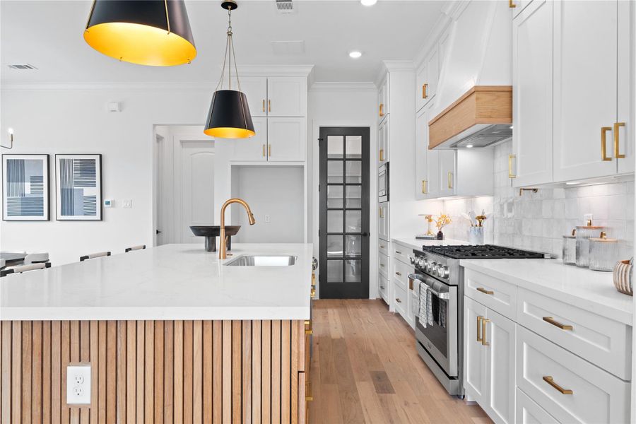 Stylish glass pantry door adds a modern and elegant touch to the space.