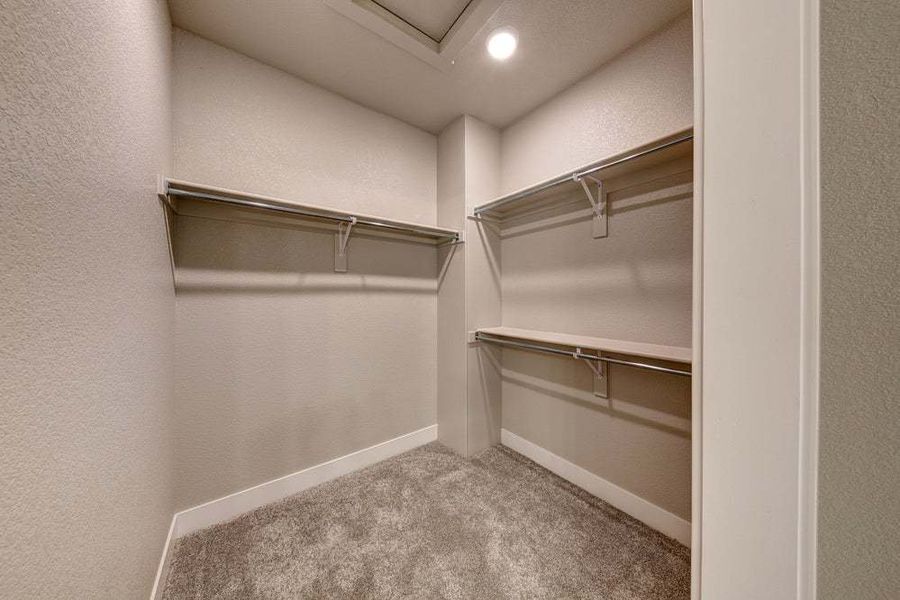 Primary Closet - Not Actual Home - Finishes May Vary