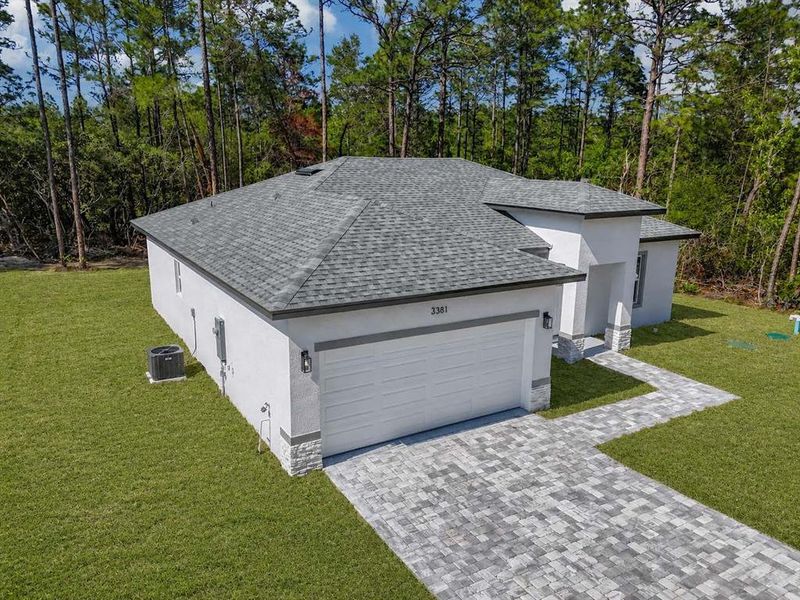 Front exterior of a new home in , Citrus Springs, FL, highlighting curb appeal (Image 2). Front exterior of a new home in , Citrus Springs, FL, highlighting curb appeal (Image 2).