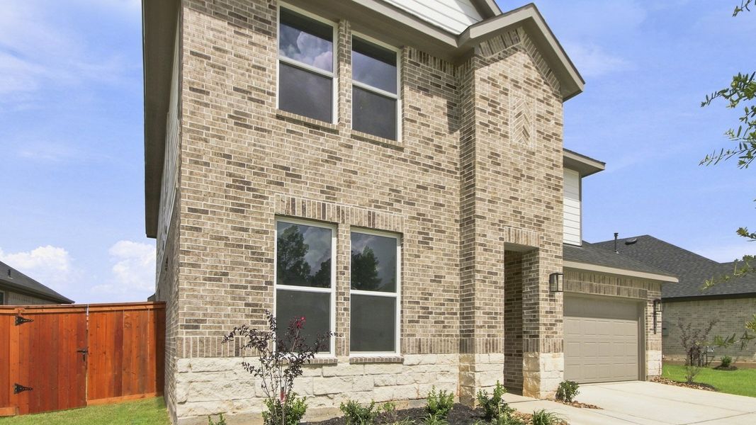Exterior details and patio area of a home in Mill Creek Estates, Magnolia (Image 3). Exterior details and patio area of a home in Mill Creek Estates, Magnolia (Image 3).