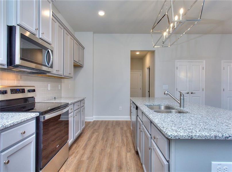 Furnished interior view inside a new home in , Homer (Image 10). Furnished interior view inside a new home in , Homer (Image 10).