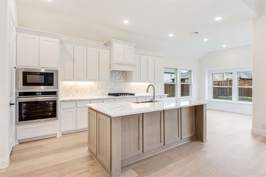 Furnished interior view inside a new home in Windsong Ranch Classic 61, Prosper (Image 6).